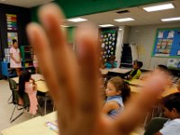 1009397793 ma nb HayMacFistDay  Second graders are eager to answer Ms. Felicia Estrela's questions on the first day of school at the Hayden McFadden Elementary School in New Bedford.  PETER PEREIRA/THE STANDARD-TIMES/SCMG : education, school, students